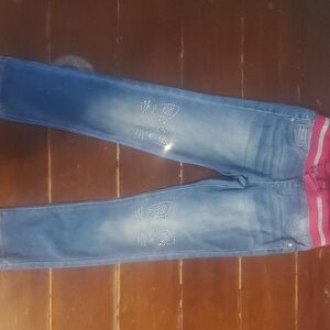 Blank NYC Skinny Blue Jeans with Rhinestone Bow Details and Pink Waistband
